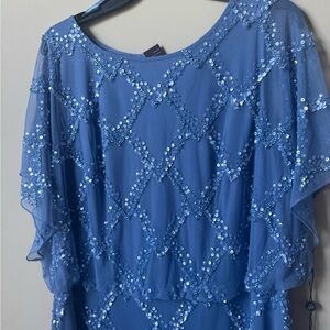 Mother of the bride dress bought at von maur and it’s new beautiful slate blue!